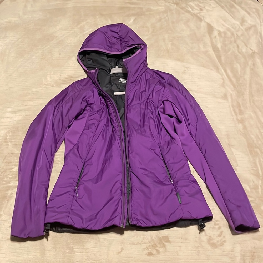 Gently used women’s Arcteryx puffy hoody. May be Atom AR.